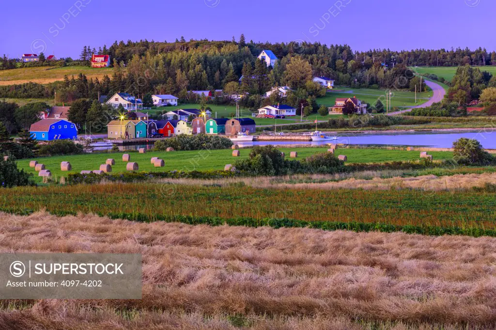 Farmhouses in a field, North Rustico, Prince Edward Island, Canada