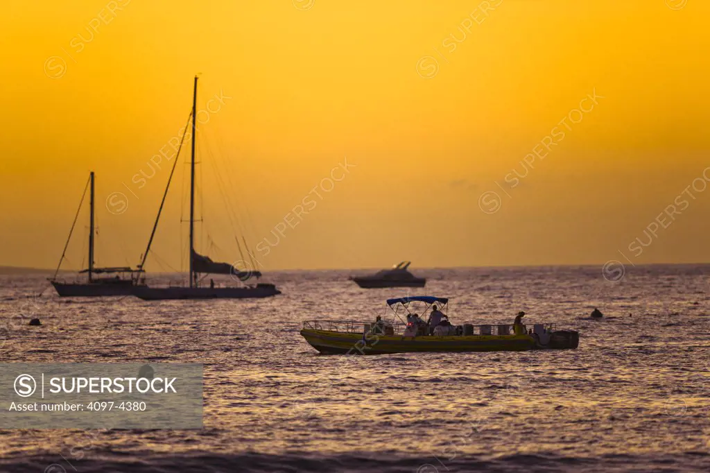 Boats at sunset, Lahaina Harbor, Maui, Hawaii, USA
