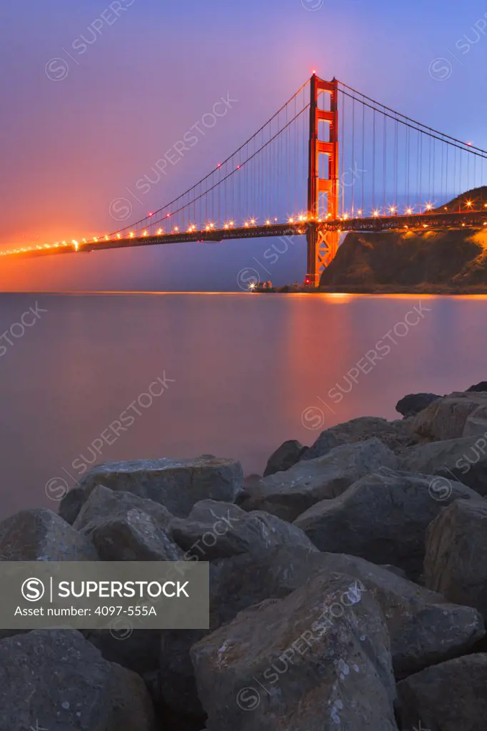 Suspension bridge lit up at dusk, Golden Gate Bridge, San Francisco Bay, San Francisco, California, USA