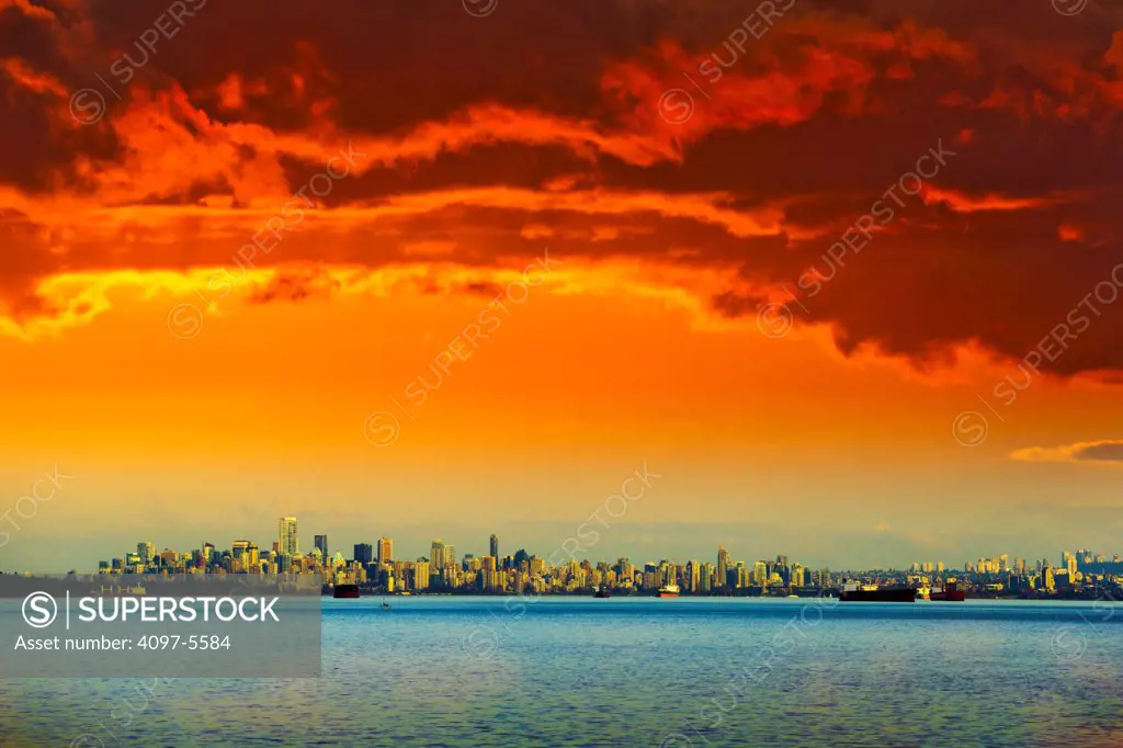 Downtown Vancouver skyline at sunset from English Bay