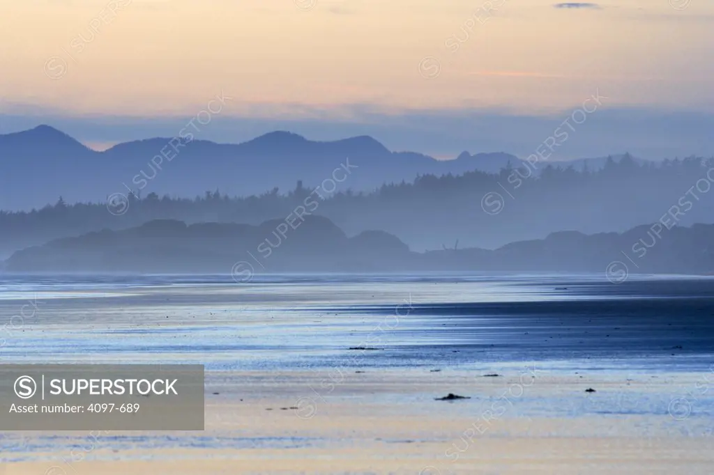 Beach with mountains in the background, Long Beach, Pacific Rim National Park Reserve, Vancouver Island, British Columbia, Canada