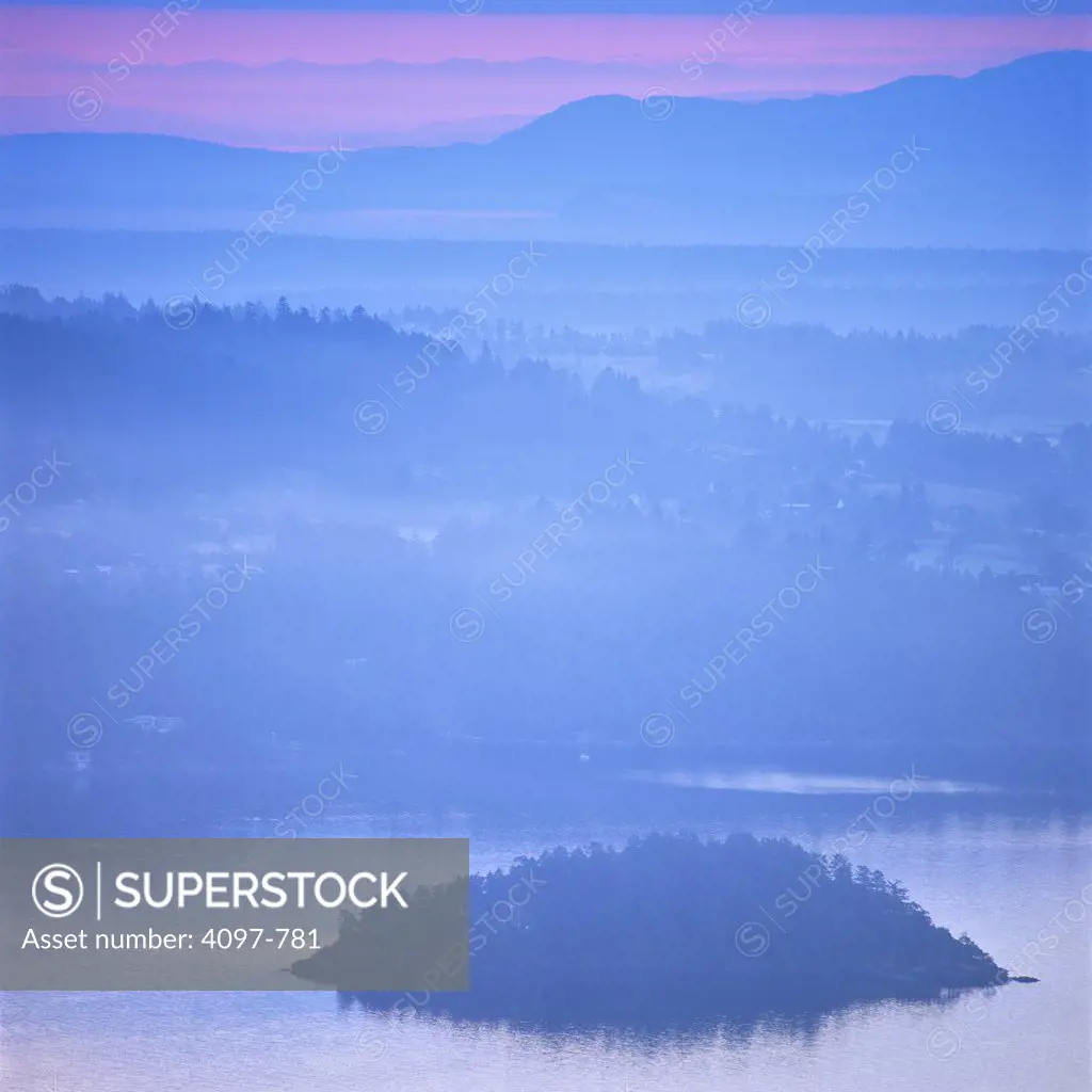 Forest covered with fog viewed from Malahat, Finlayson Arm, Saanich Peninsula, Vancouver Island, British Columbia, Canada