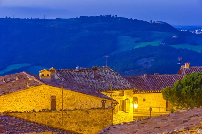 street lamp at dusk in hill town, Tuscany