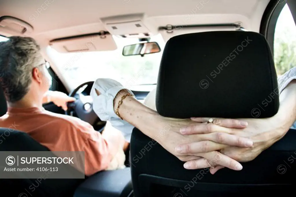 Couple on a road trip in car