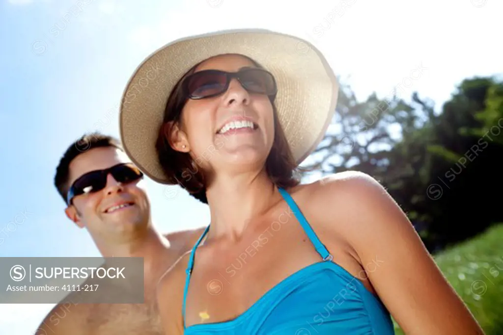 Close-up of a couple smiling on the beach, Glen Arbor, Leelanau County, Michigan, USA