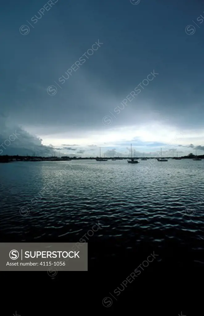 Yachts moored under a grey sky in Rhode Island, USA.