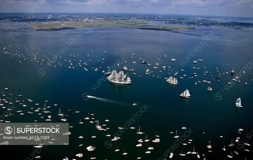 Aerial view of Boston harbour with Tall Ship parade, Massachusetts, USA.