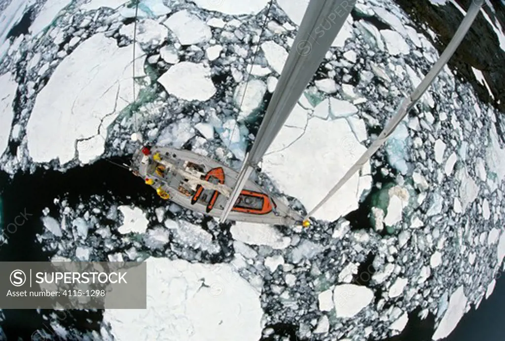 Skip Novak's steel yacht 'Pelagic' motors carefully through pancake ice on the Antarctic Peninsula.