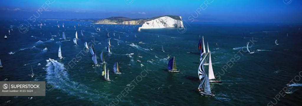 The fleet rounding the Needles, during the America's Cup Jubilee in 2001, Isle of Wight, UK.