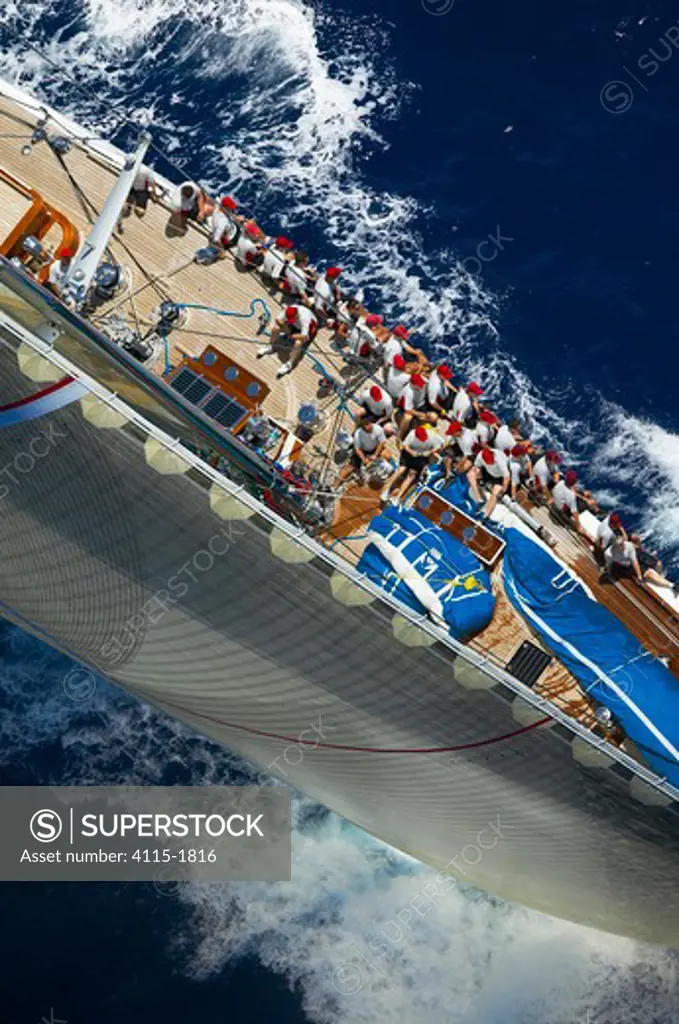 Looking down the forestay of J-Class 'Ranger', with the crew seated along the upside gunwale during Antigua Classic Yacht Regatta 2005, Caribbean