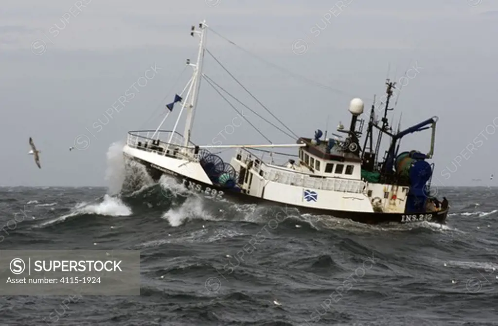 MFV 'Courageous' shooting trawler nets into the North Sea on a choppy day. September 2006