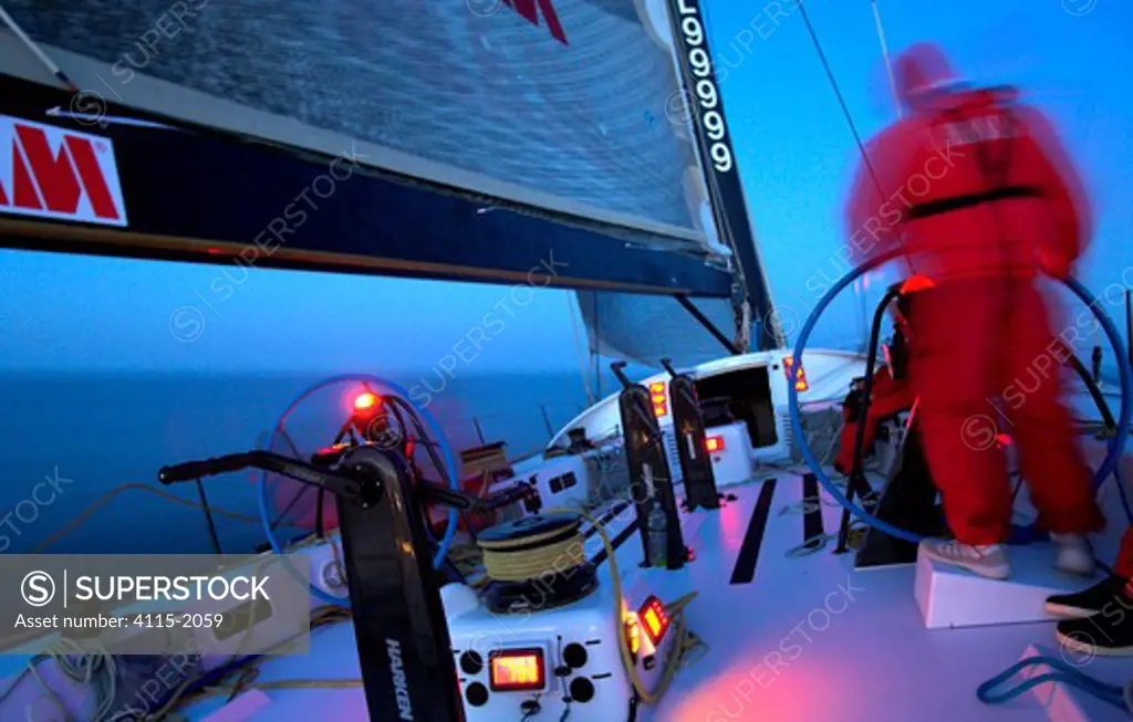 Maximus continues to race after dusk with a man at the helm during the 2006 Newport to Bermuda Race