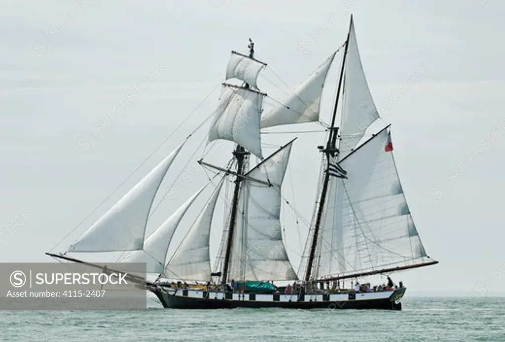 French brigantine 'La Recouvrance' sailing across the Solent in light winds, June 2007.