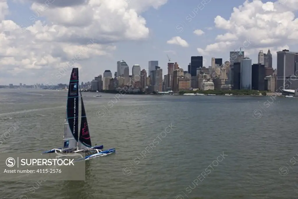 Maxi trimaran 'Banque Populaire V', skippered by Pascal Bidgorry, arriving in Manhattan, New York, for North Atlantic record attempt. 27 June 2009.