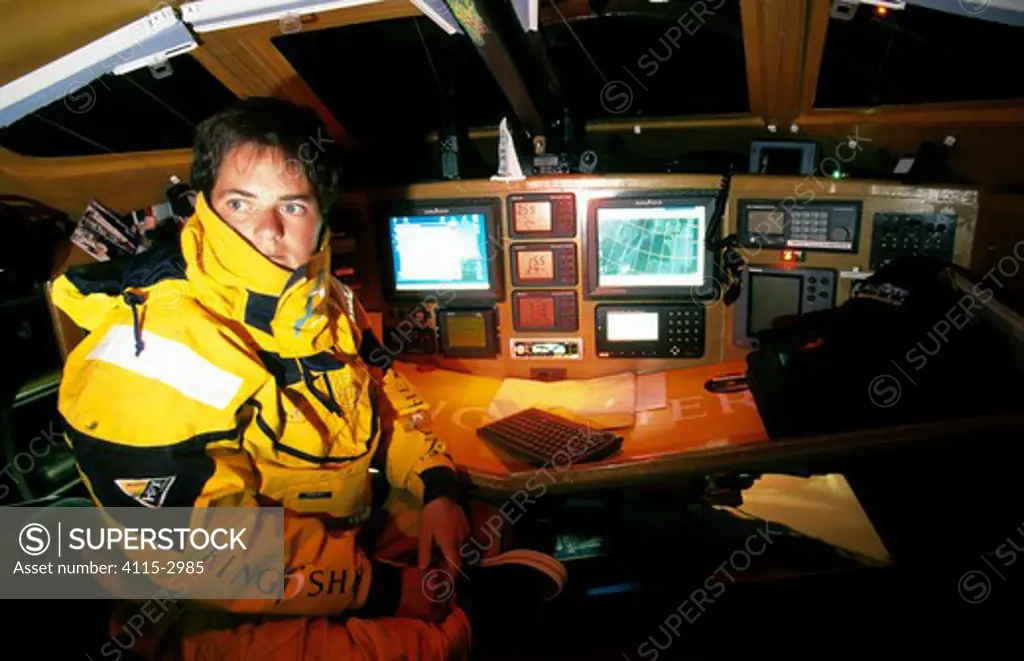 Ellen MacArthur at the nav station aboard her Open 60 'Kingfisher', in which she came 2nd in the Vendee Globe singlehanded round the world race, 2000-01.