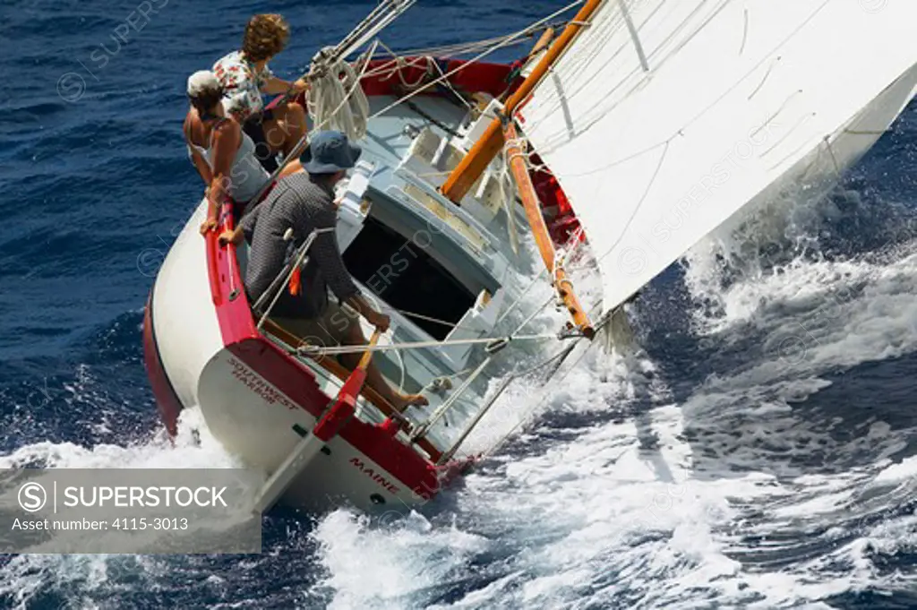The 23 foot Kaufman 'Grace' beating upwind at Antigua Classic Yacht Regatta, Caribbean, 2004. Property Released.
