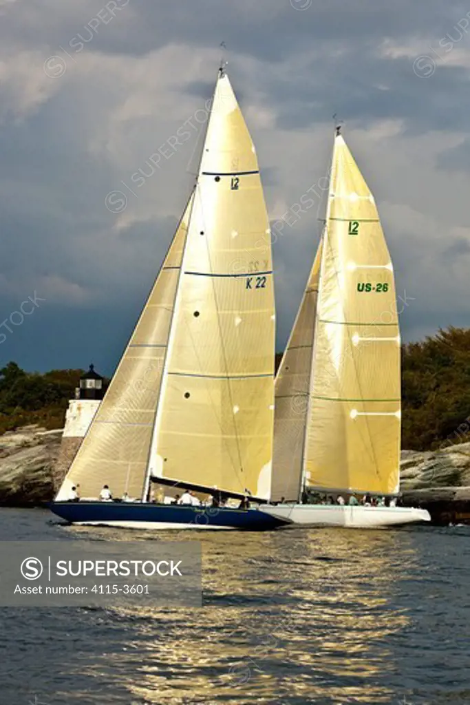 Yachts sailing near the Castle Hill lighthouse, 12 Metre World Championships, Newport, Rhode Island, USA. September 2009.