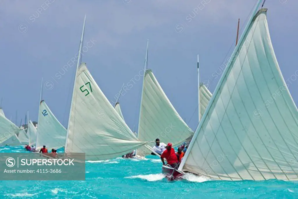 Fleet racing in the Bahamian Sloop regatta, Georgetown, Exumas, Bahamas. April 2009.
