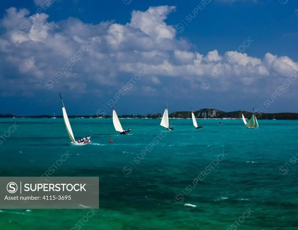 Fleet racing during the Bahamian Sloop regatta, Georgetown, Exumas, Bahamas. April 2009.