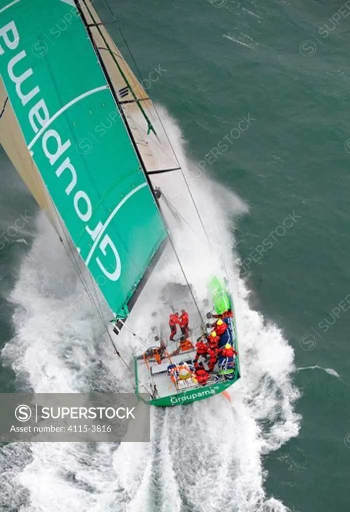 Open 70 'Groupama' in heavy seas off Selsey Bill during the Sevenstar Round Britain and Ireland Race, August 2010. All non-editorial uses must be cleared individually.