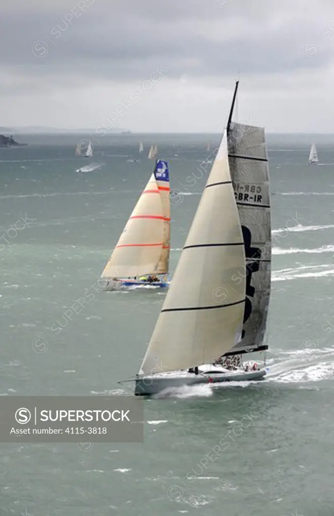 Open 70s 'Leopard' and 'Telefonica' starting from Cowes during the Sevenstar Round Britain and Ireland Race, August 2010. All non-editorial uses must be cleared individually.