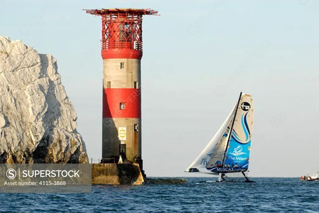 Oman Sailboat 'The Wave, Muscat' passing The Needles Lighthouse during Round the Island Race, Isle of Wight, England, June 2010.
