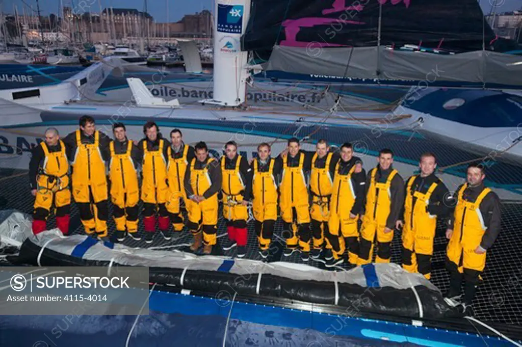 Crew on board maxi trimaran 'Banque Populaire V' ahead of Jules Verne Trophy attempt. Brest, Brittany, France, January 2011. All non-editorial uses must be cleared individually.