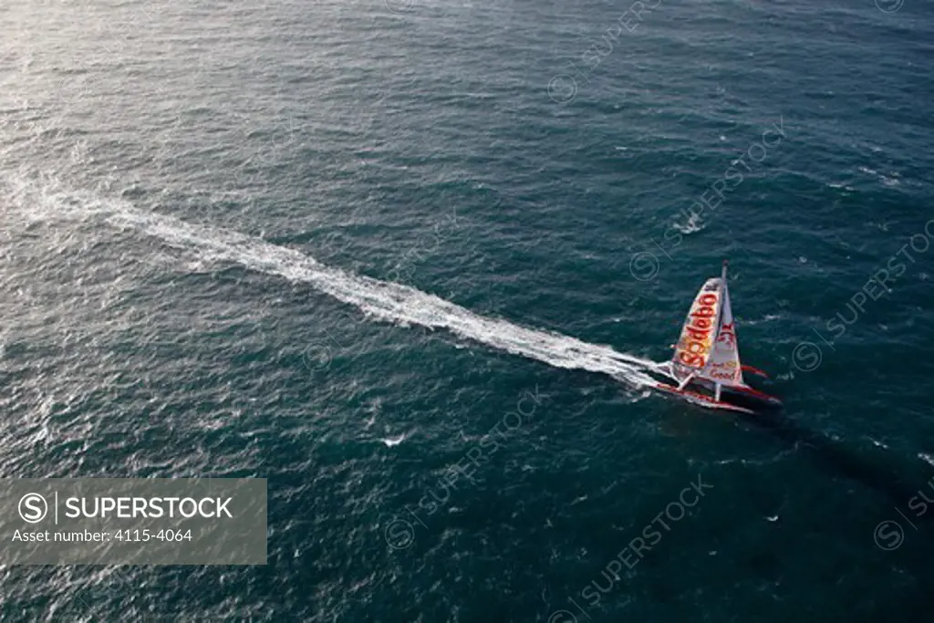 Aerial view of maxi trimaran 'Sodebo', skippered by Thomas Coville, departing on singlehanded circumnavigation record attempt. Brest, France, January 2011. All non-editorial uses must be cleared individually.