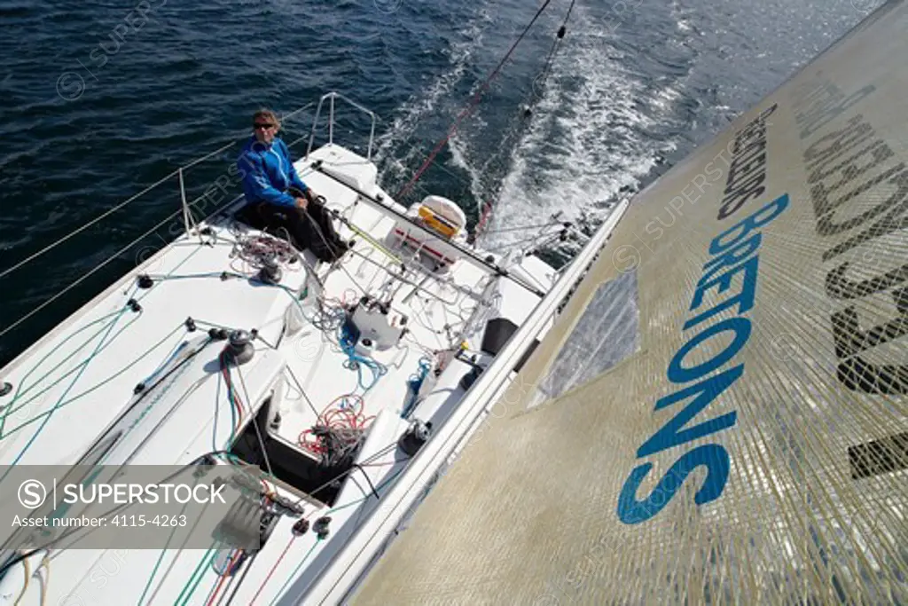 Skipper Michel Bothuon helming on board 'Les Recycleurs Bretons' ahead of La Solitaire du Figaro 2011. Brest, France, May 2011. All non-editorial uses must be cleared individually.