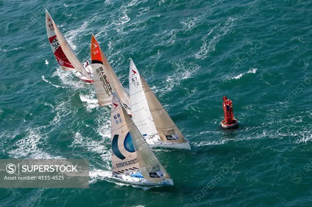 Aerial view of yachts racing around marker during the Tour de Bretagne a la Voile, Lorient, Brittany, France, September 2011. All non-editorial uses must be cleared individually.