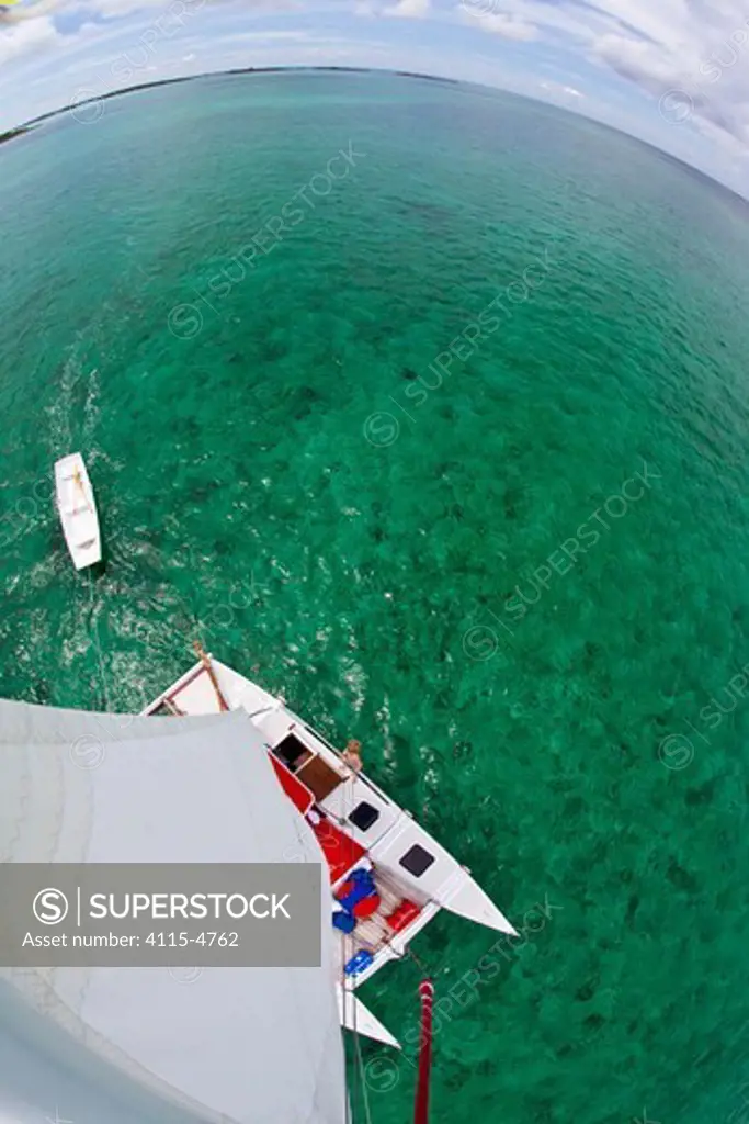 View from the masthead of 30ft Tiki catamaran 'Abaco'. Exumas, Bahamas, Caribbean. June 2009, Model and property released.