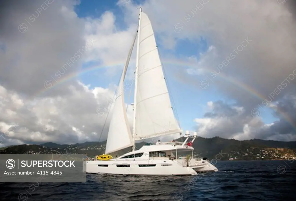 Privilege 745 catamaran 'Matau' cruising off Grenada, Caribbean, January 2010. Property released.