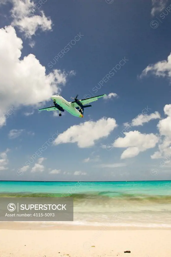 Aeroplane landing at Juliana Airport, Maho Bay, near Philipburg, St. Maarten (Dutch side of island) Caribbean. August 2006.