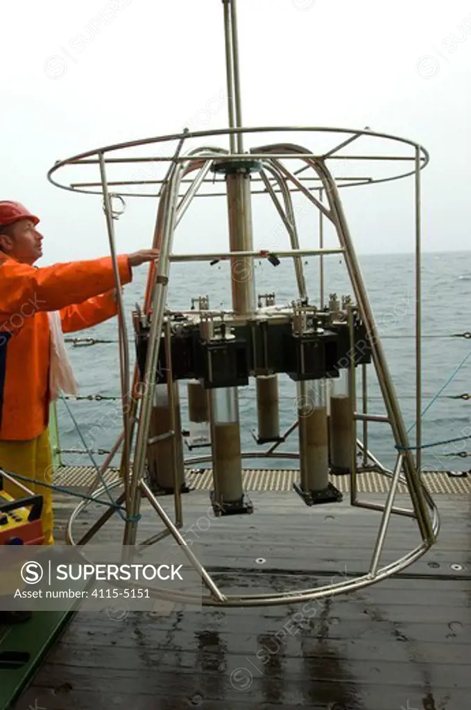Recovering seabed samples from the Megacorer, onboard James Cook research vessel over the mid Atlantic ridge, June 2010