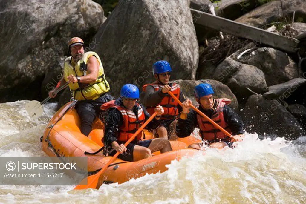 Whitewater rafting down Dragon's Tooth rapid on the Deerfield River in Rowe, Massachusetts, USA. Dryway run, Class IV. September 2006