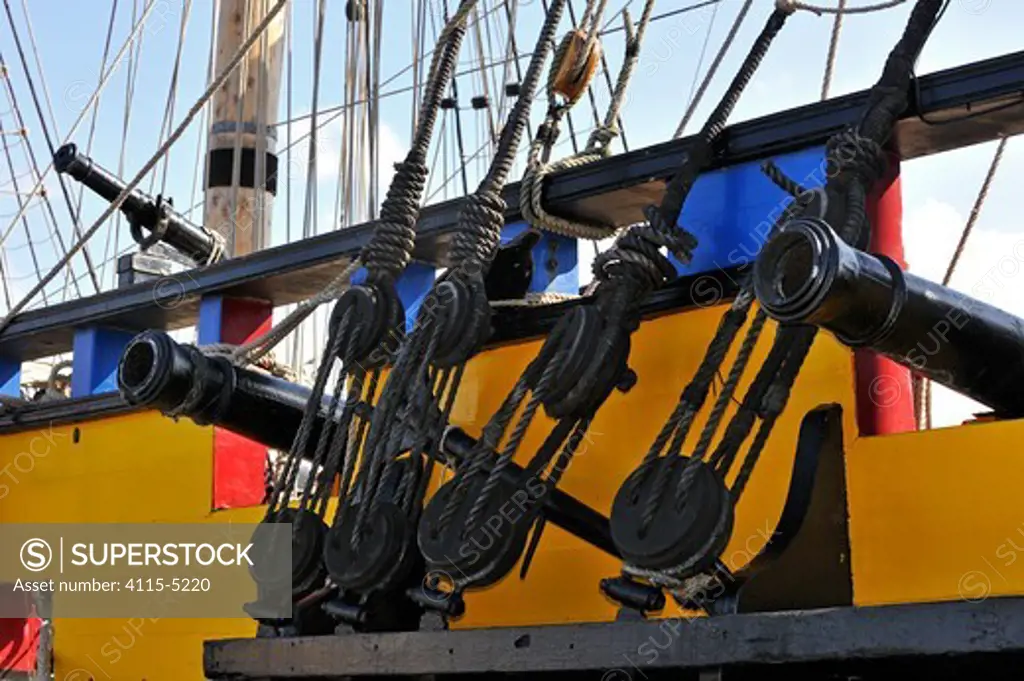 Wooden blocks and cannons on board the ""Grand Turk / Etoile du Roy"", a three-masted sixth-rate frigate built in 1996 as a replica of HMS Blandford, built in 1741, Saint Malo, Brittany, France, September 2010