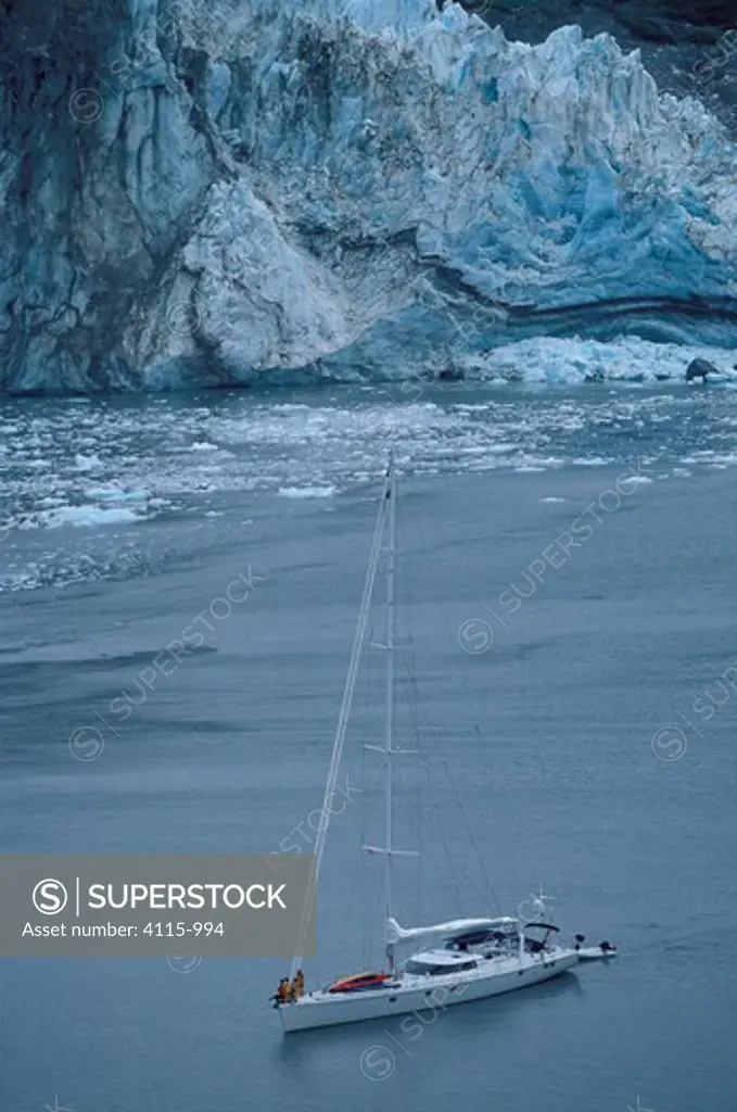 88ft sloop 'Shaman' anchored at the foot of a glacier, Kenai peninsula, Alaska. 2001