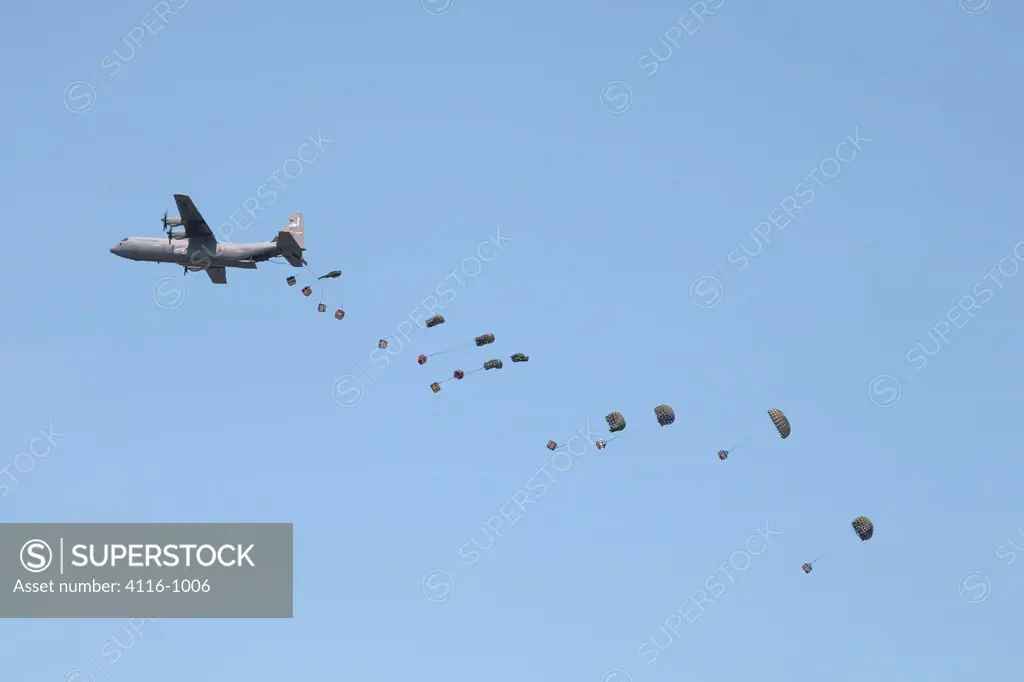 Cargo parachuted from C-130 Hercules