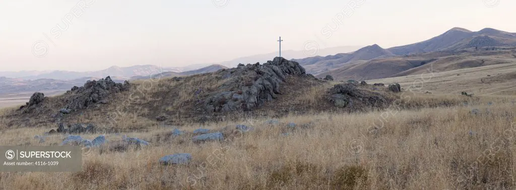 USA, California, Arvin, Panorama of Old Cross on Hill in San Joaquin Valley