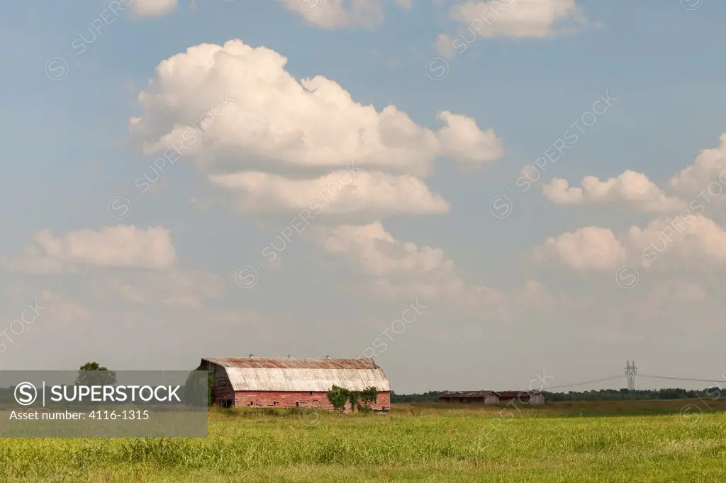 Old barns in a field, Scott, AR