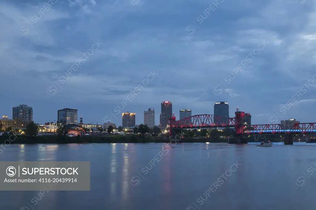 Reflections of colorful lights, Little Rock skyline, evening