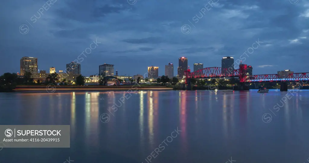 Reflections of colorful lights, Little Rock skyline, evening panoramic long exposure
