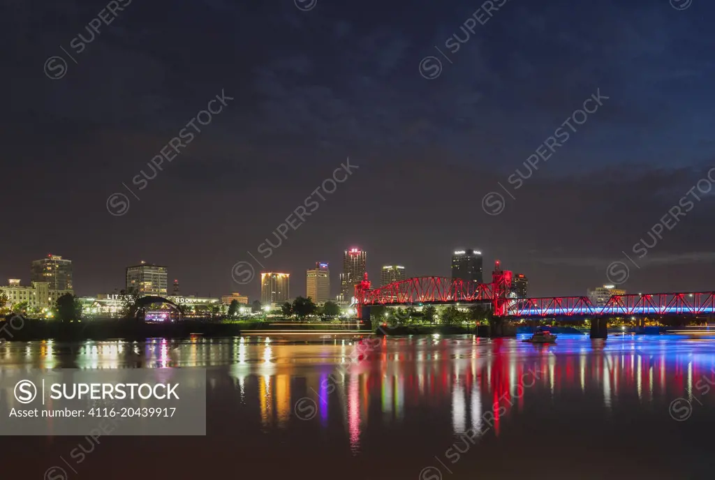 Reflections of colorful lights, Little Rock skyline, night time, long exposure