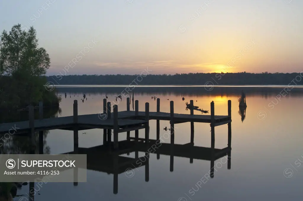 Reflection of a pier in a lake, Pickthorne Lake, Arkansas, USA