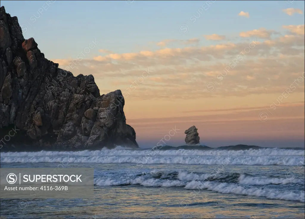 Rock formations in an ocean, Morro Rock, Morro Bay, California, USA