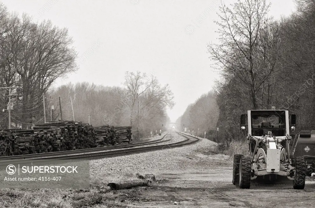 USA, Arkansas, Cabot, Bulldozer near railroad tracks