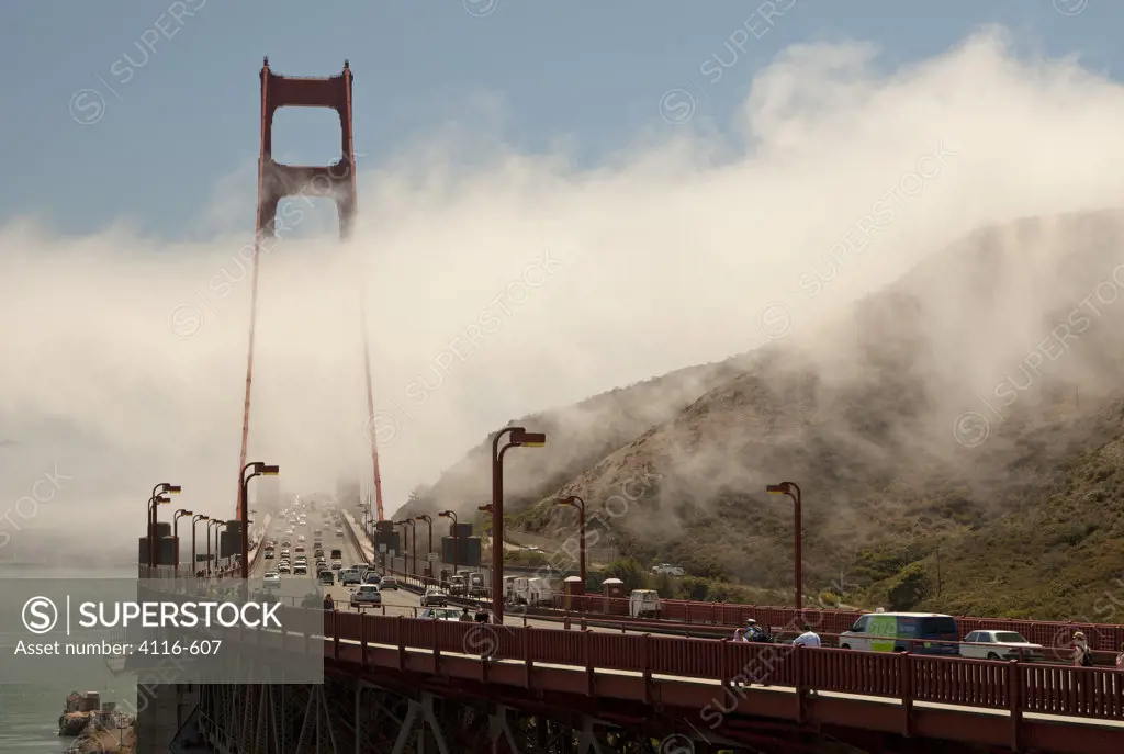 Tourists and cars on a bridge, Golden Gate Bridge, San Francisco Bay, San Francisco, California, USA