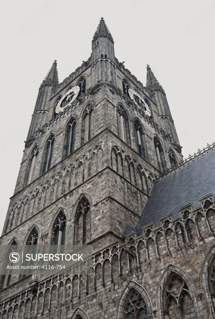 Low angle view of a clock tower, Cloth Hall, Ypres, West Flanders, Flemish Region, Belgium