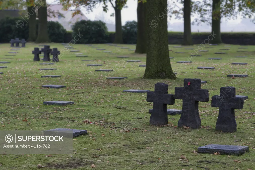 Tombstones in a cemetery, German War Cemetery Of Langemark, Langemark, Langemark-Poelkapelle, West Flanders, Flemish Region, Belgium