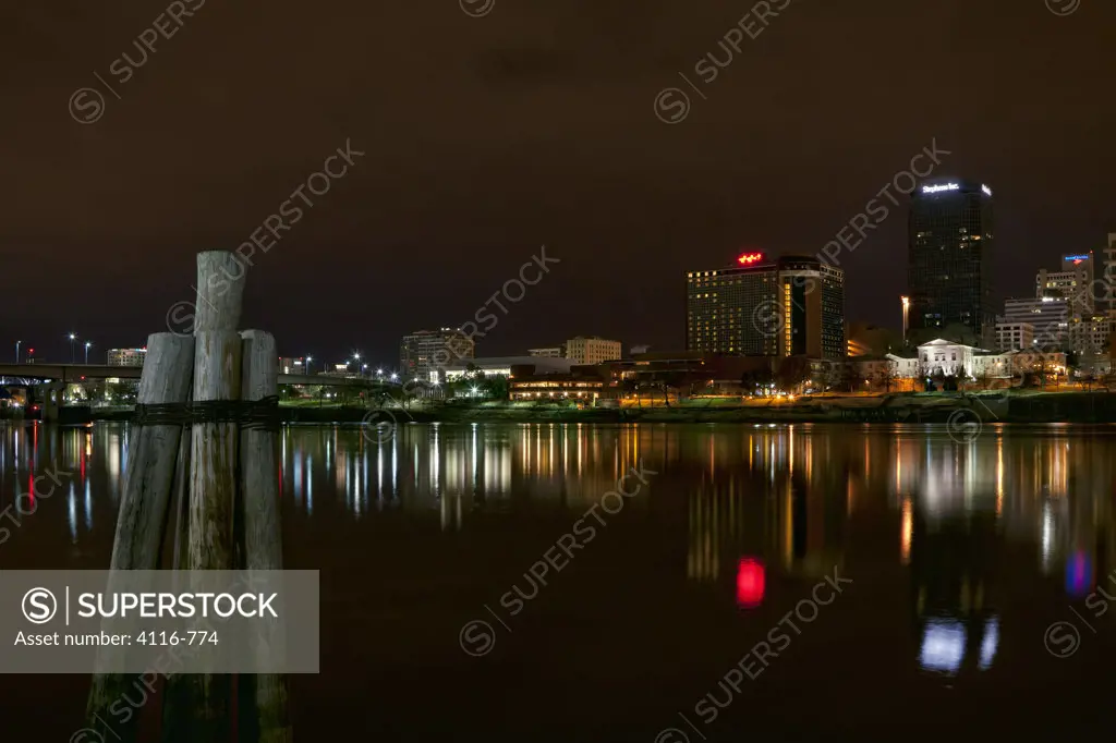 Reflection of building in water, North Little Rock, Arkansas River, Arkansas, USA